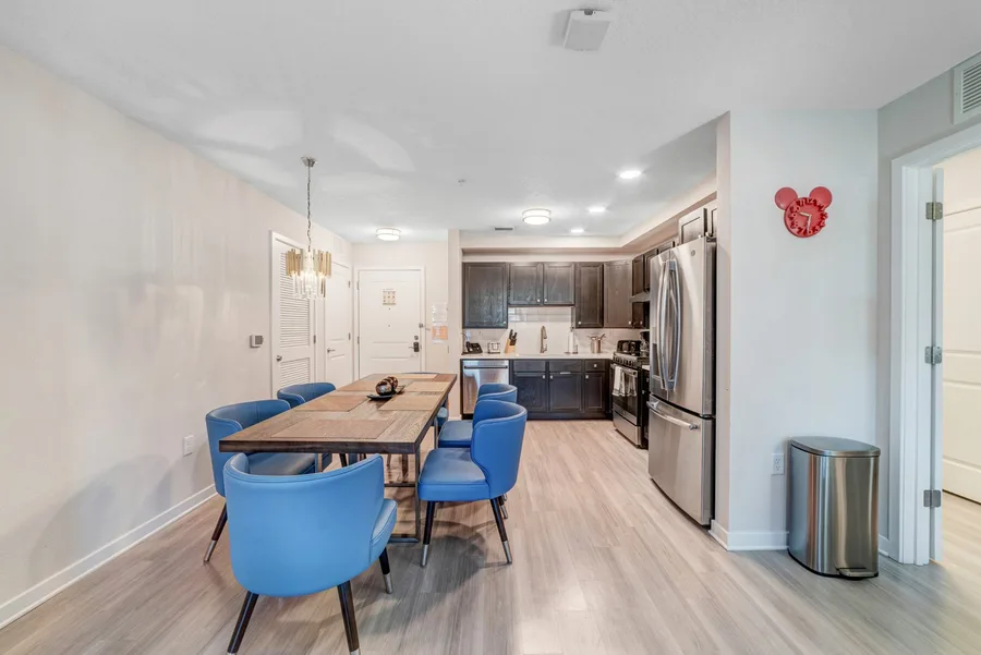 Dining table for six beside the kitchen