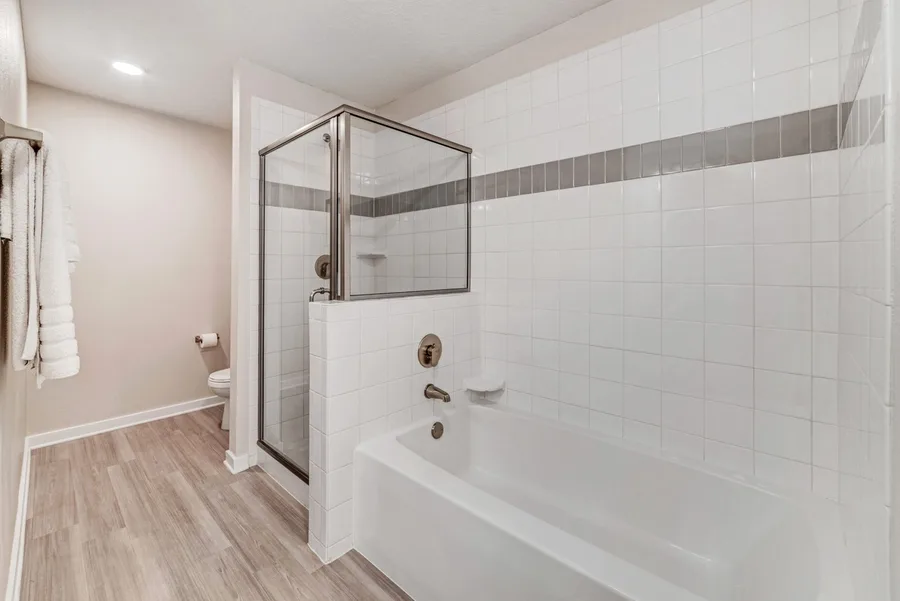 Second bathroom with shower and bath
